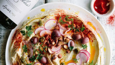 Loaded Hummus with olives, capers, and almonds