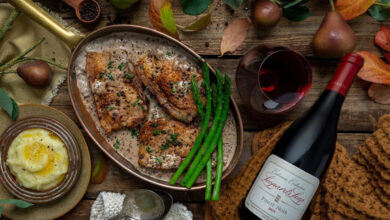 Pork chops served with creamy pepper sauce