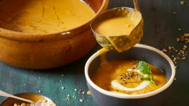 Spicy carrot and red lentil soup with walnut dukkah