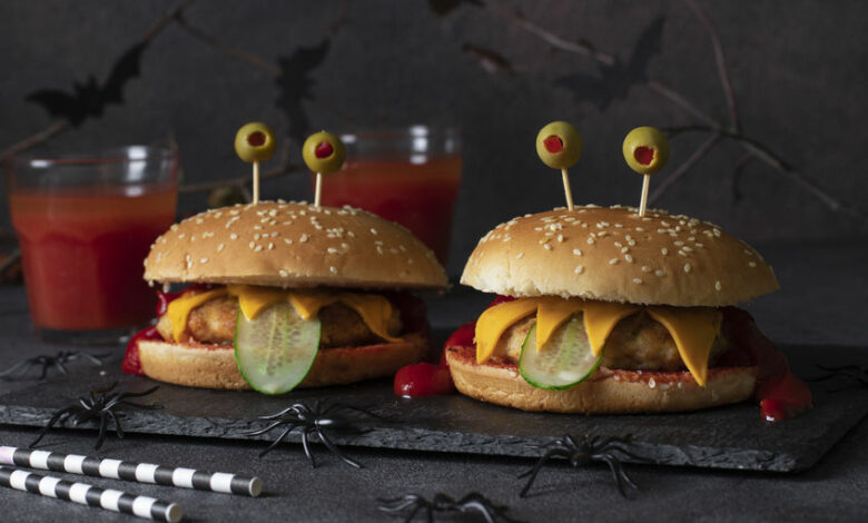Monster chicken burger with cheese, green olives and cucumber