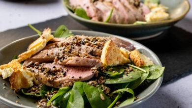 Enjoy a fusion of flavours with pork fillet and baked feta salad