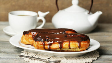 Homemade eclairs with chocolate drizzle