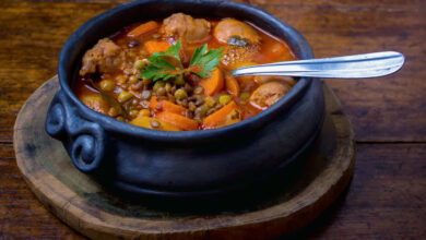 Slow cooked beef sausage and lentil stew in a tomato base