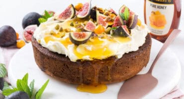 Honey and almond cake with mascarpone, fresh figs and pistachios