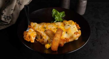 Meat-free Monday veggie fingers in tomato fondue