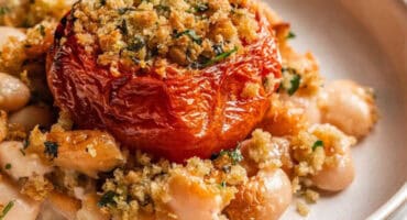 Air fryer roasted tomatoes and beans with herby breadcrumbs