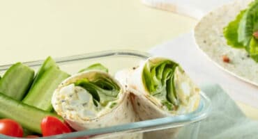 Bacon and egg wrap with onion and chives cream cheese