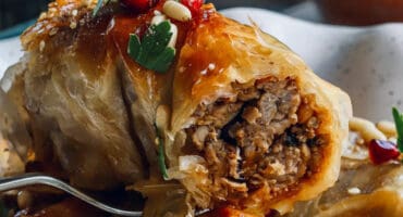 Spiced pork phyllo rolls with pine nuts