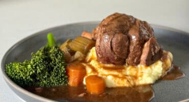 Slow cooked lamb shank with red wine