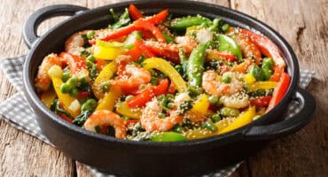 Prawn and veggie stir-fry with sesame seeds