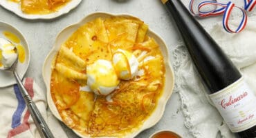 Paper-thin crêpes soaked in zesty orange sauce