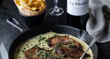 Tender pork steaks with Dijon cream sauce and frites