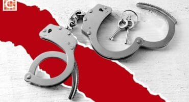 Image for illustration purposes. Handcuffs and keys