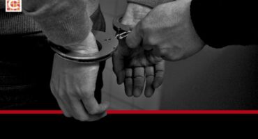 Man in handcuffs. Image for illustration purposes.