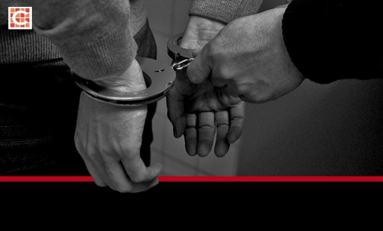 Man in handcuffs. Image for illustration purposes.