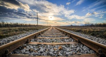 railway line leading to sunset