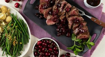 Seared beef fillet topped with a cherry port sauce