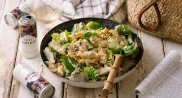 Chicken Caesar pasta salad with crispy onions