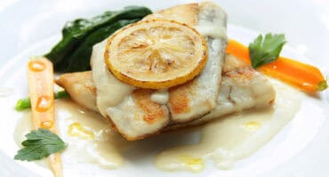 Pan-seared hake with lemon butter sauce