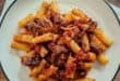 Oxtail rigatoni with olive seasoning and parmesan cheese
