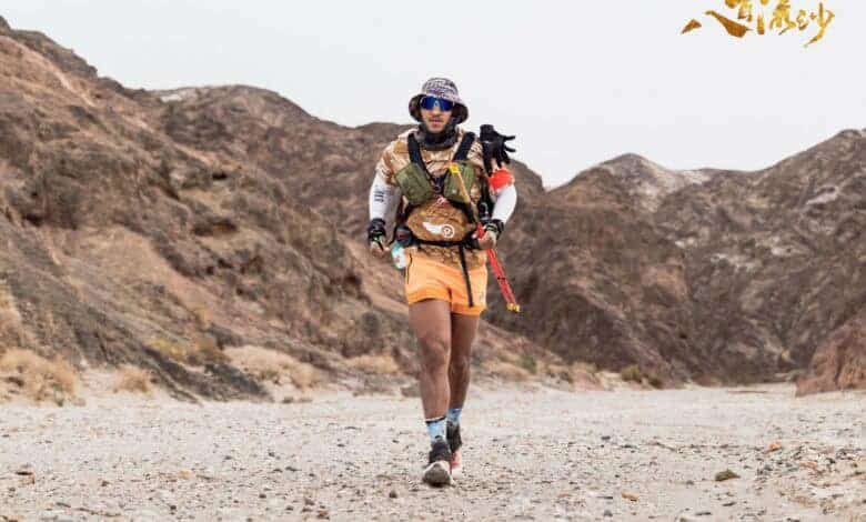 An ultra-runner remains in the top 10 after three days in the Gobi, fighting knee trouble and brutal desert conditions with fewer than 40km to go.