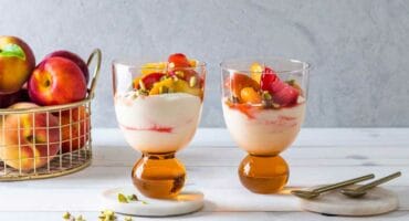 Spicy stone fruit compote with honeyed yoghurt and pistachios