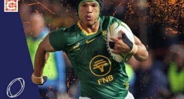 Kurt-Lee Arendse for the Springboks running with a ball in his hand.