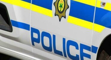 A side view of a vehicle belonging to the South African Police Services.