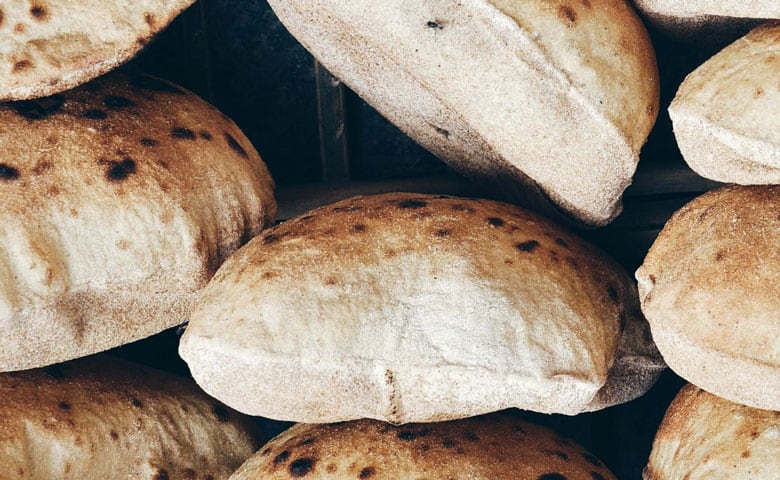 Traditional roosterkoek made on the braai grid
