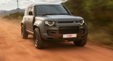 SUV driving on a dirt road