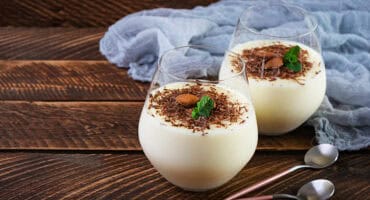 Sweet milk pudding with almonds and chocolate chips