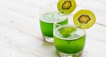 Kiwi caipiroska with fresh lime and vodka