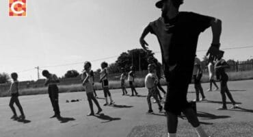 Sasch Cornelissen teaching youth how to dance.