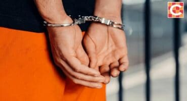 Man in handcuffs.