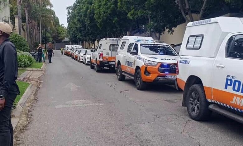 Picture of a street with JMPD vehicles