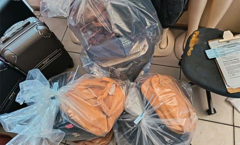 Fake handbags and shoes in a packet.