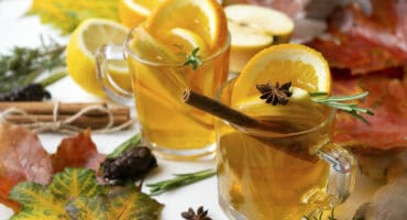 Steamy and spicy autumn citrus toddy