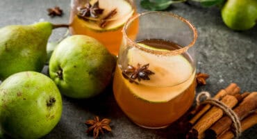 Spiced pear smash cocktail with honey and lemon