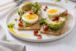 Smoky avo, bacon and soft egg on crisp melba