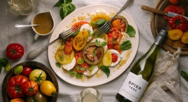 Exotic tomato salad with fior di latte and mustard vinaigrette