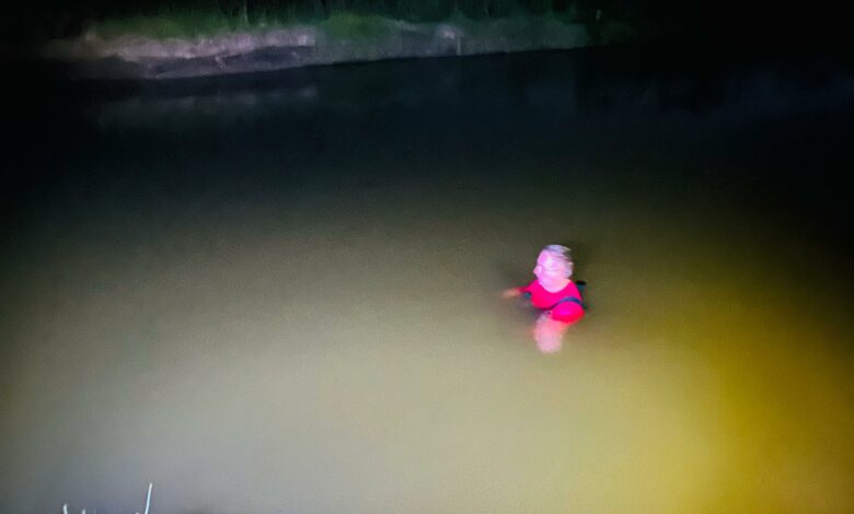 A police officer searches for a missing boy.