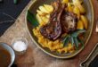 Crisp pork chops with creamy mashed butternut and potato wedges