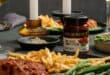 Sun-dried tomato pesto-baked salmon with asparagus spears