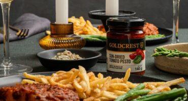 Sun-dried tomato pesto-baked salmon with asparagus spears