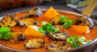 Easy-to-make mushroom and coconut curry with mustard seeds