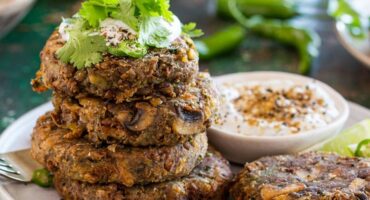Spiced mushroom and lentil cakes with cool mint raita