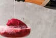 Rosé Champagne float topped with berry sorbet