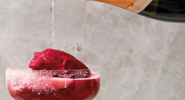 Rosé Champagne float topped with berry sorbet