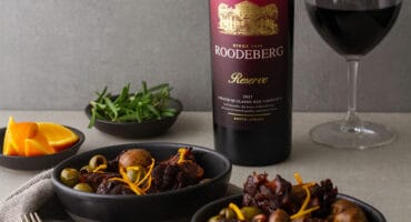 Slow-cooked oxtail with green olives and orange