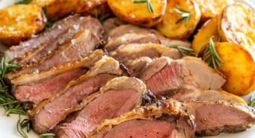 Roast lamb and potatoes with chimichurri